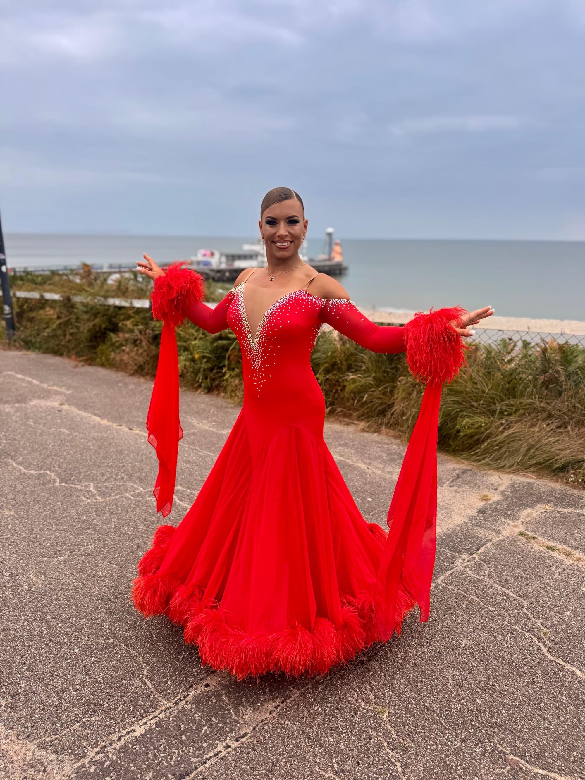 Red Standard Dress with Swarovski Crystals and Flowing Skirt